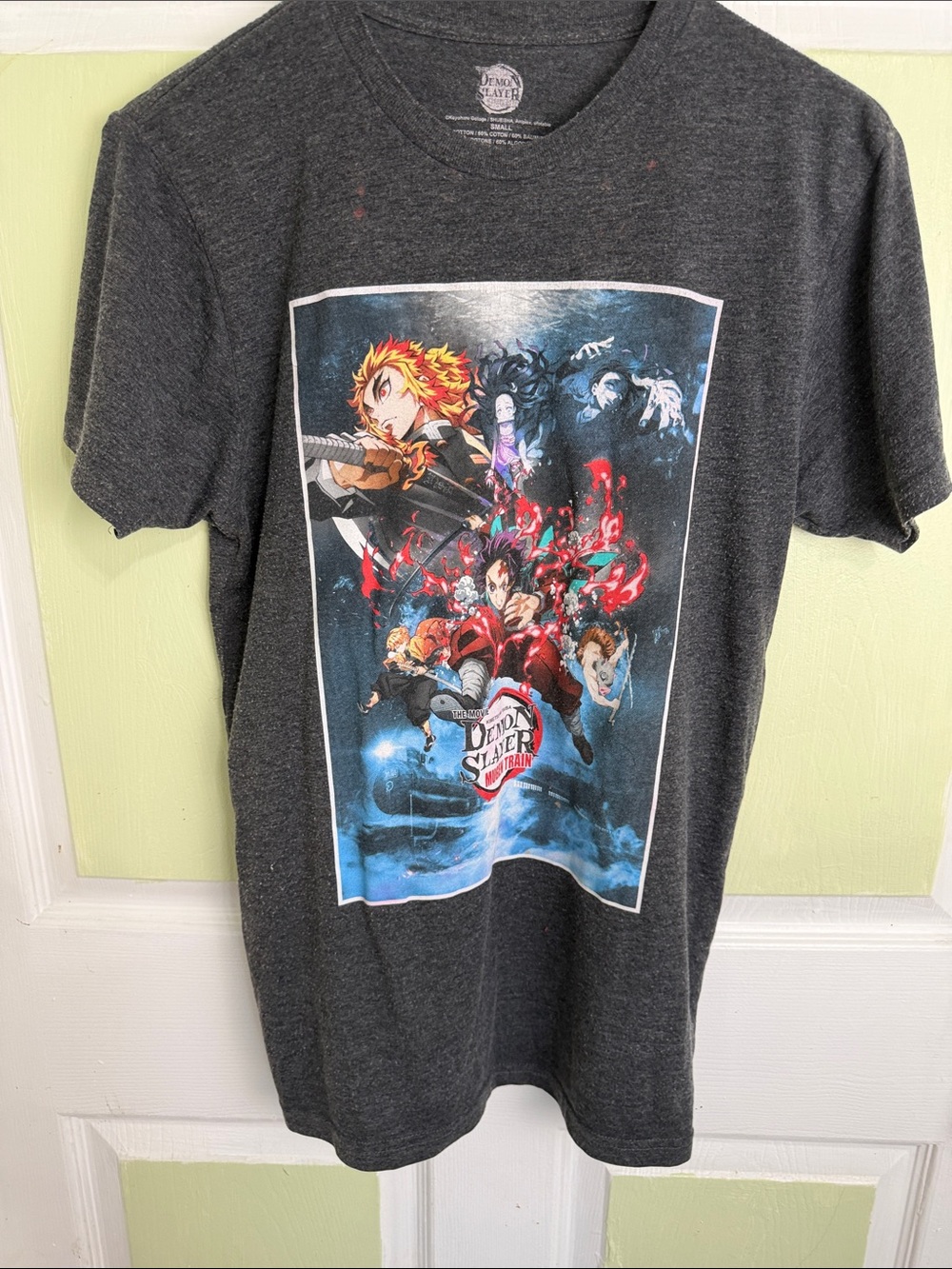 (2209) Demon Slayer Graphic Tee with Bold Multi-Color Print